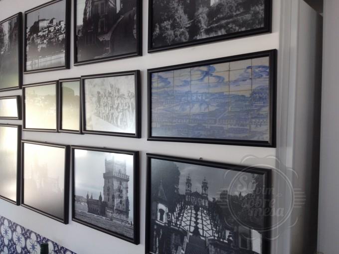 [Quadros com imagem de vários lugares de Portugal fazem a decor do local]